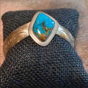 Silver bracelet with teal stone